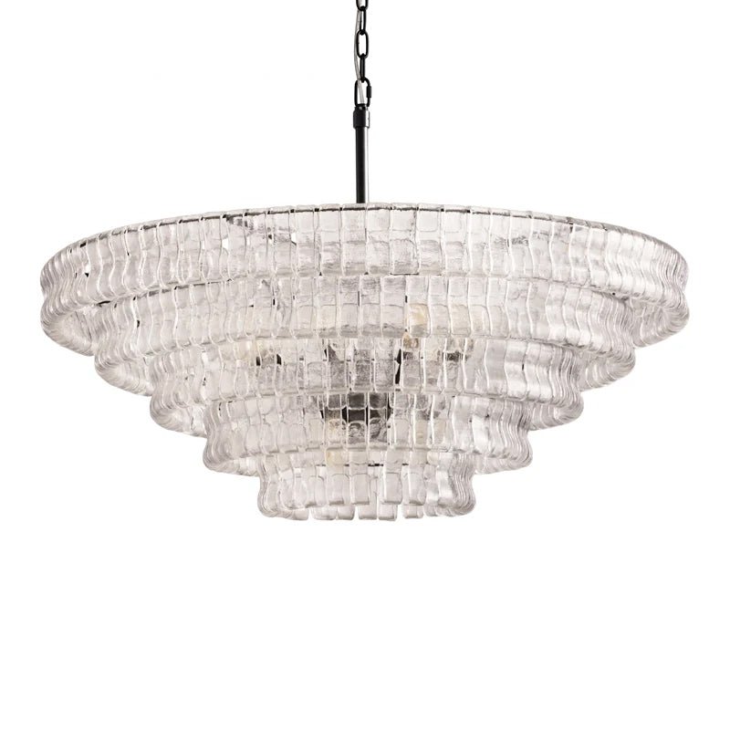 Unlit and on a white background, this clear glass Clérachic chandelier has a black stem and five wide tiers.