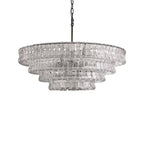 Clear glass tiers of a Clérachic chandelier with a black chain, shown on a plain white background.