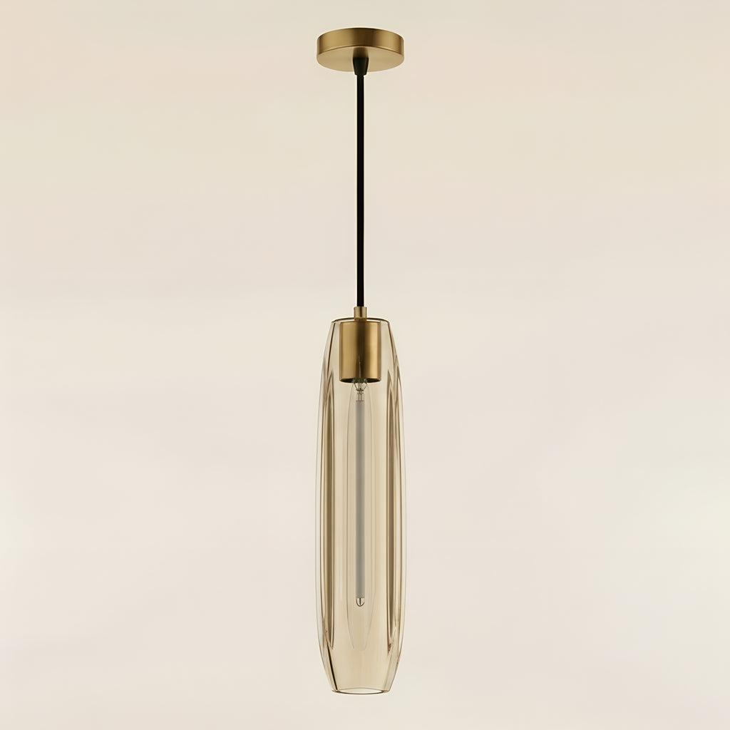 The clear pendant unlit in daylight, its thick cut glass and vertical facets reading as solid crystal rather than a glow