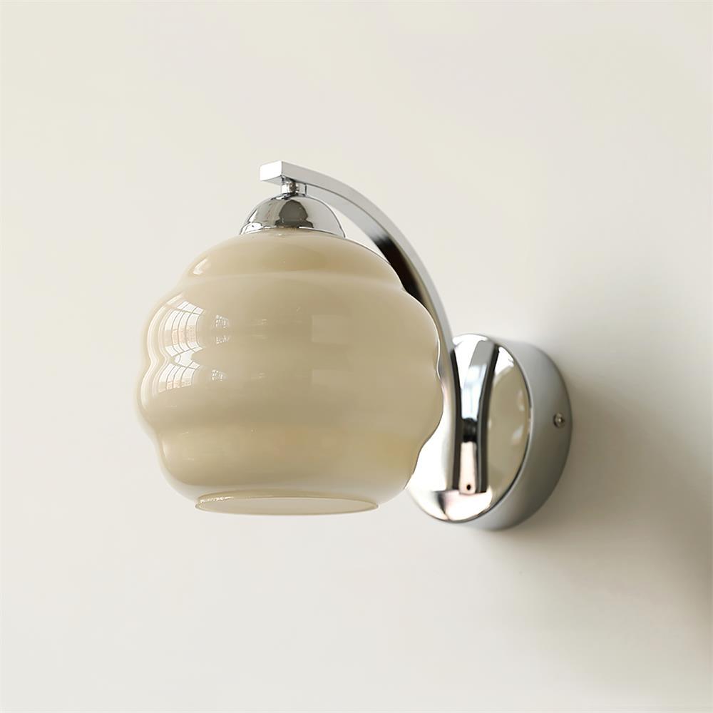 Clérachic chrome wall sconce and beige lantern shade in close studio view, the glossy glass still unlit.