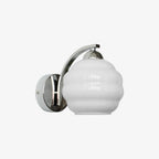 Clérachic chrome wall sconce with a white lantern shade, the open bottom of the glass visible in studio light.