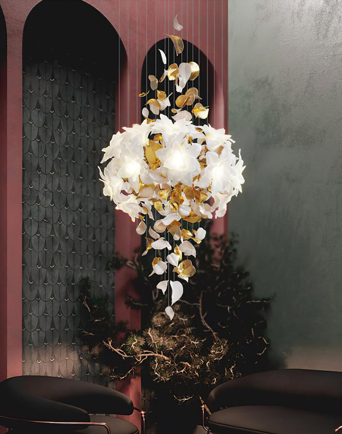 Against a dusty-pink and sage wall with arched panelling, this Clérachic chandelier hangs as a round white petal cluster with leaves below.