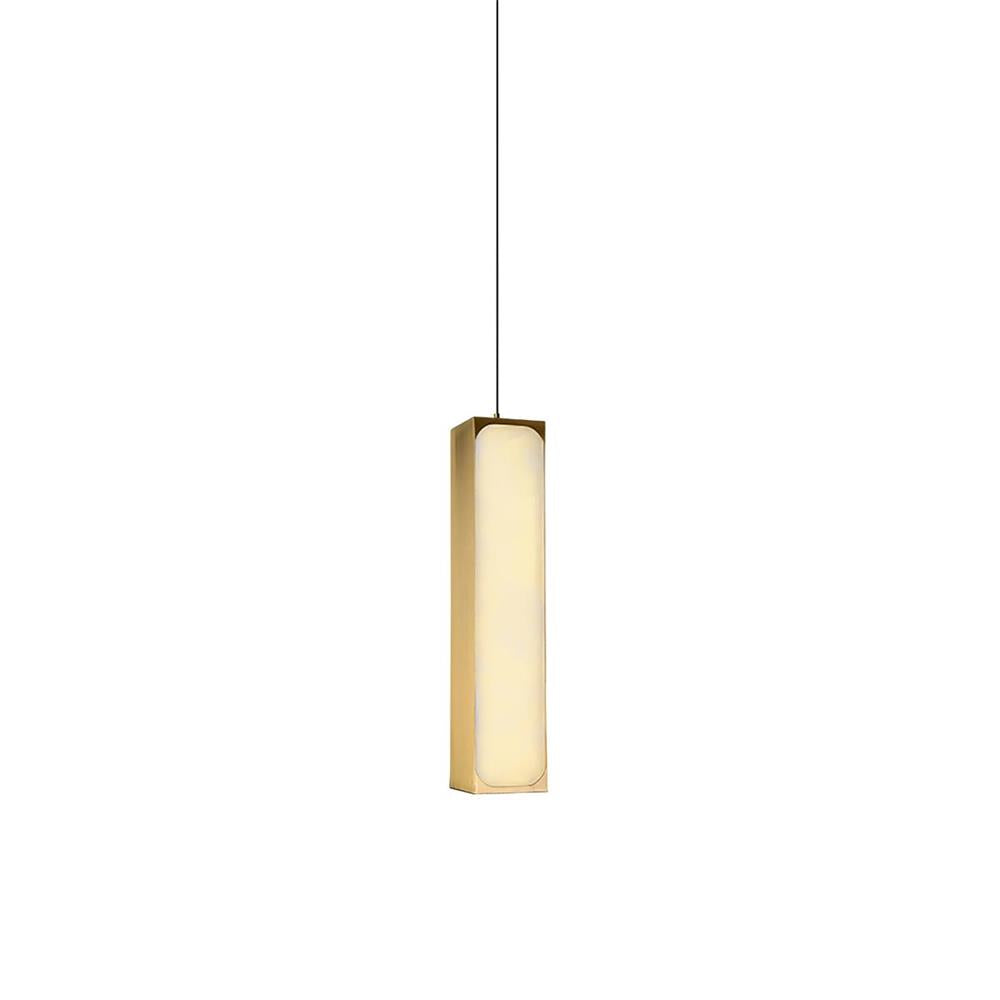 Clérachic Gleam pendant on a plain white ground, brushed brass edges framing the tall alabaster shade.