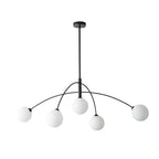 Black and white Clérachic chandelier on a white background, with five globes hanging below the swept black arms.