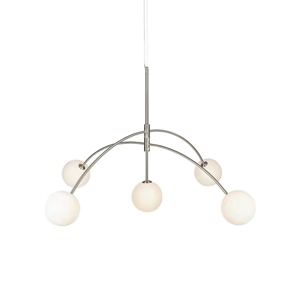 Chrome Clérachic chandelier on a white backdrop, with a slender rod and globes that glow softly in a warm cream tone.