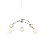 Chrome Clérachic chandelier on a white backdrop, with a slender rod and globes that glow softly in a warm cream tone.