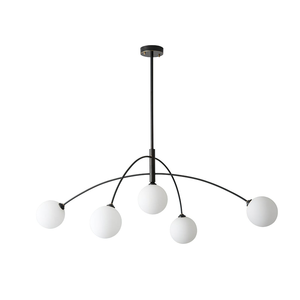 Black and white Clérachic chandelier on a pale background, with the arms curved over to hold five lit globes.