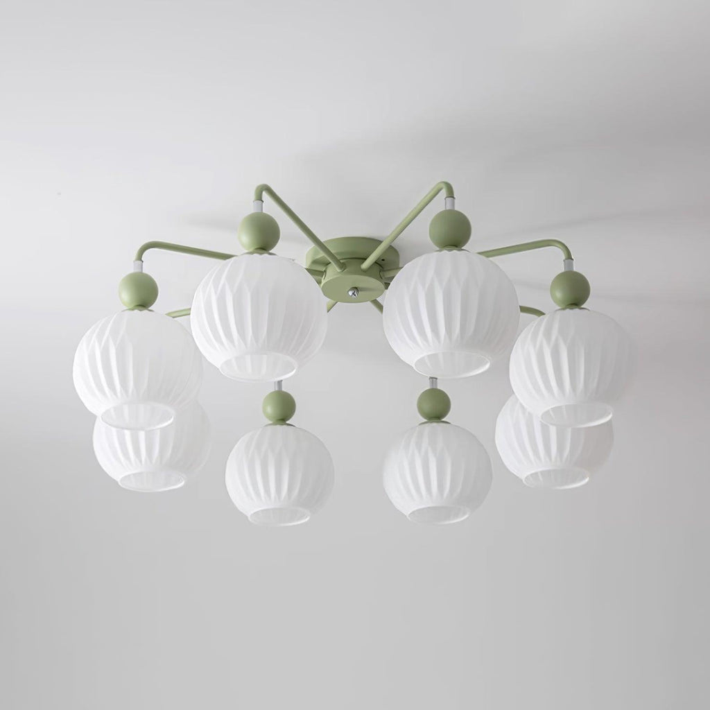 Unlit eight-globe Clérachic ceiling light in green, with two tiers of ribbed white globes on thin curved arms.