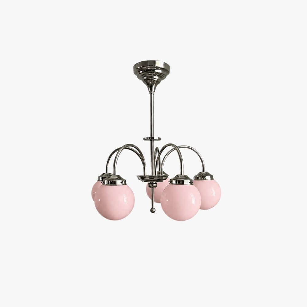A Clérachic chandelier with five pink glass globes on curved polished metal arms, shown on a plain white backdrop.