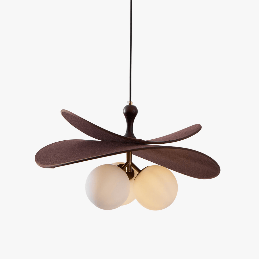 Front view of this Clérachic pendant on a white backdrop, with coffee-brown fabric petals over three opal glass globes on a brass stem.