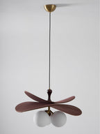 Unlit Clérachic pendant on a black cord from a brass canopy, with grey-white globes under brown fabric petals.