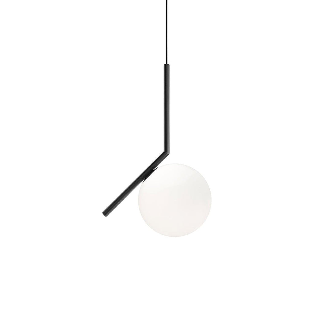 A Clérachic pendant with a black stem bent at an angle holds a white glass globe, shown on a plain white background.