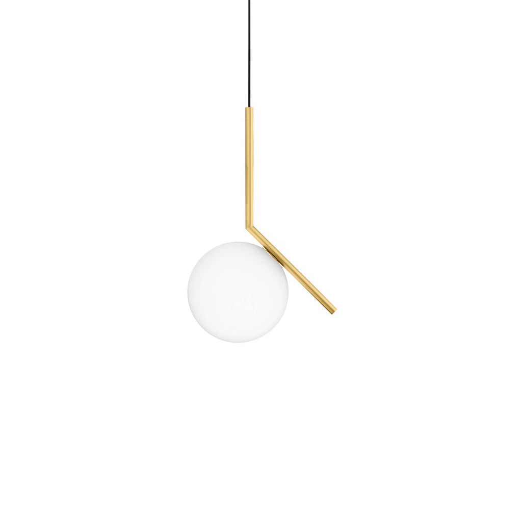 A Clérachic globe pendant on pure white, with the brass stem bending sideways to hold a clear-edged frosted ball at its left.