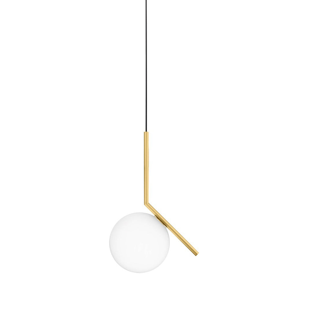 A Clérachic pendant with a brass stem and a small frosted globe hangs from a black cord on a plain white backdrop.