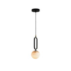 Clérachic Gloruvyd pendant shown against white, its alabaster globe suspended in a slim black oval frame.