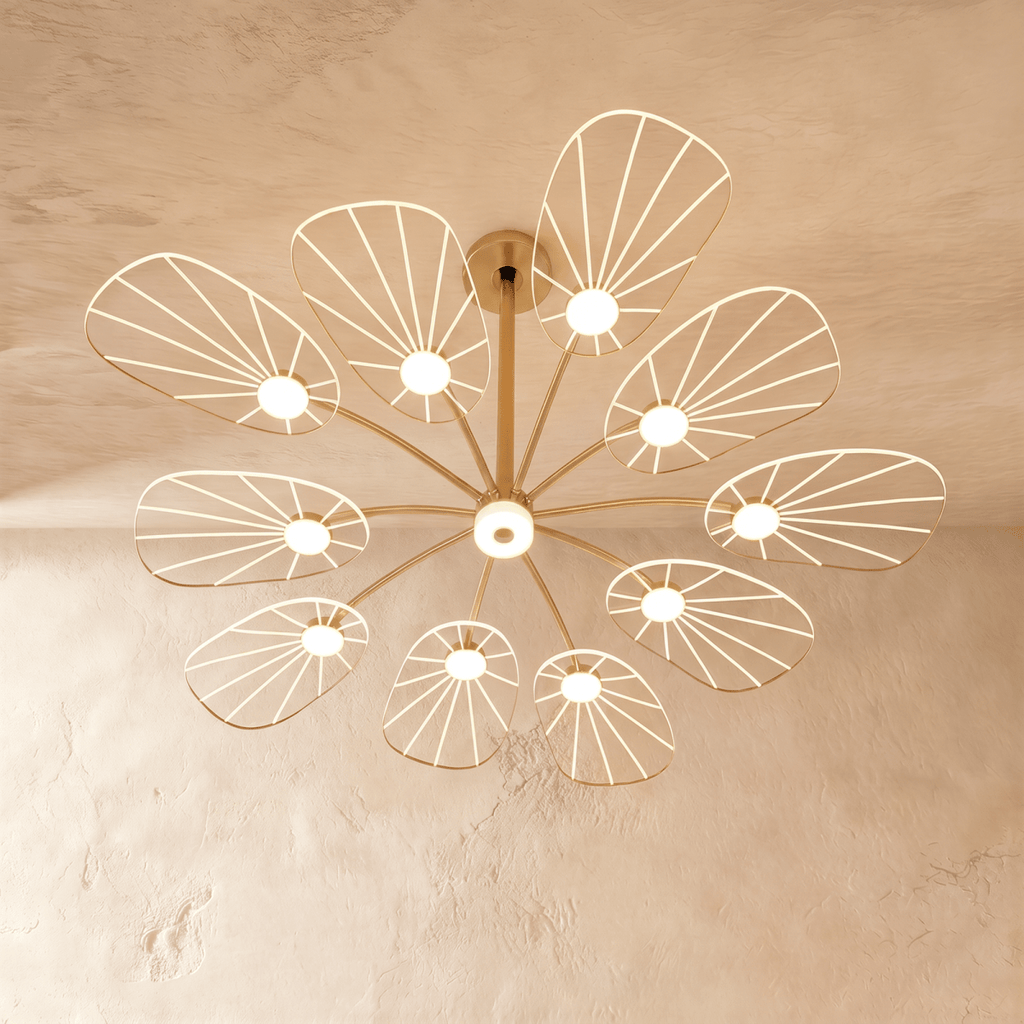 Clérachic leaf-shaped chandelier with 10 lit acrylic panels forming a full flower shape on a slim brass frame.