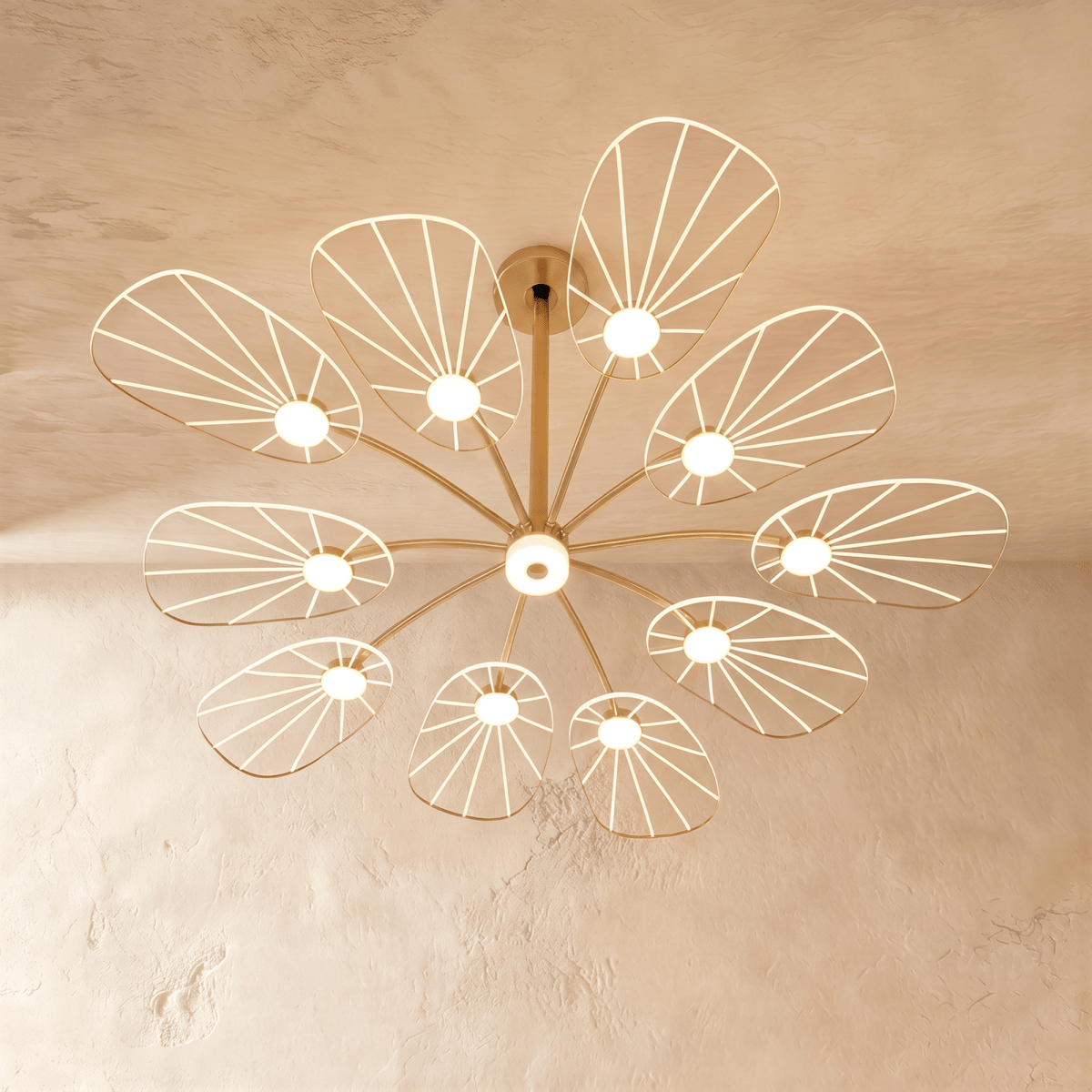 Clérachic leaf-shaped chandelier with 10 lit acrylic panels forming a full flower shape on a slim brass frame.