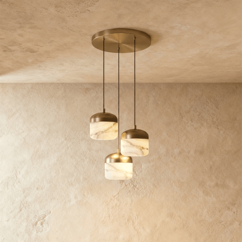 Clérachic alabaster pendant light in the 3-light cluster, unlit, three stone drum shades grouped under one canopy.