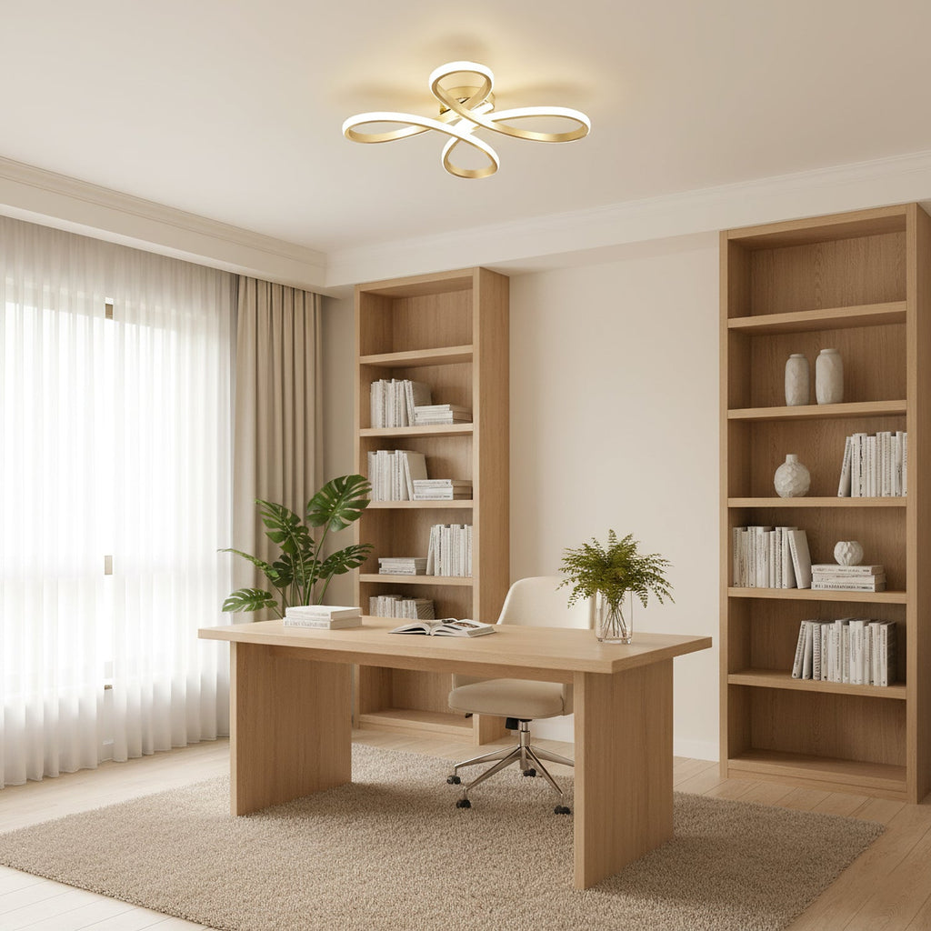 A Clérachic ceiling light above a pale wooden desk in a home study, with open bookshelves, a green plant and sheer curtains.