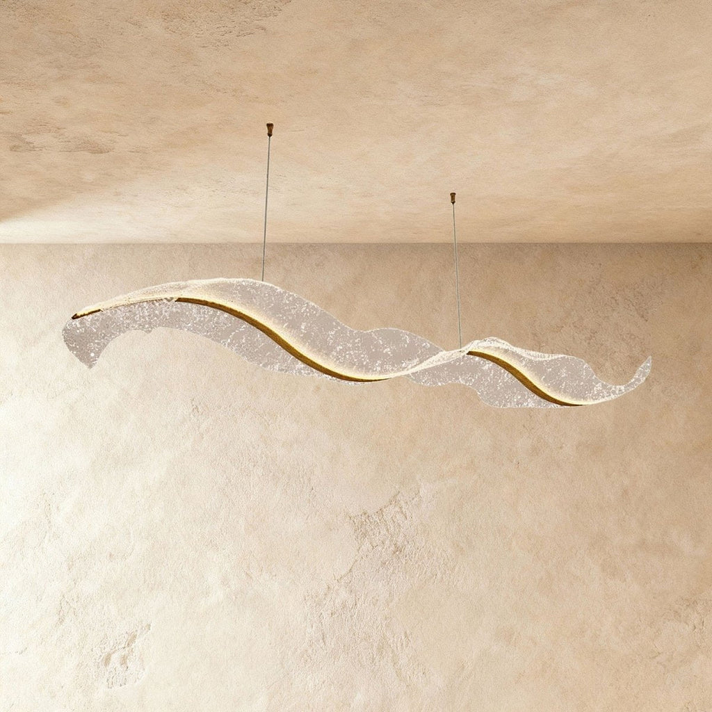Clérachic's undulating chandelier forms a graceful double curve, hung from two slim ceiling cables.