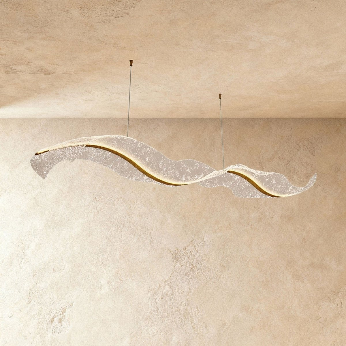 Clérachic's undulating chandelier forms a graceful double curve, hung from two slim ceiling cables.