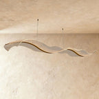 Clérachic's wave chandelier shows a finer woven-look texture across its curved acrylic panels.