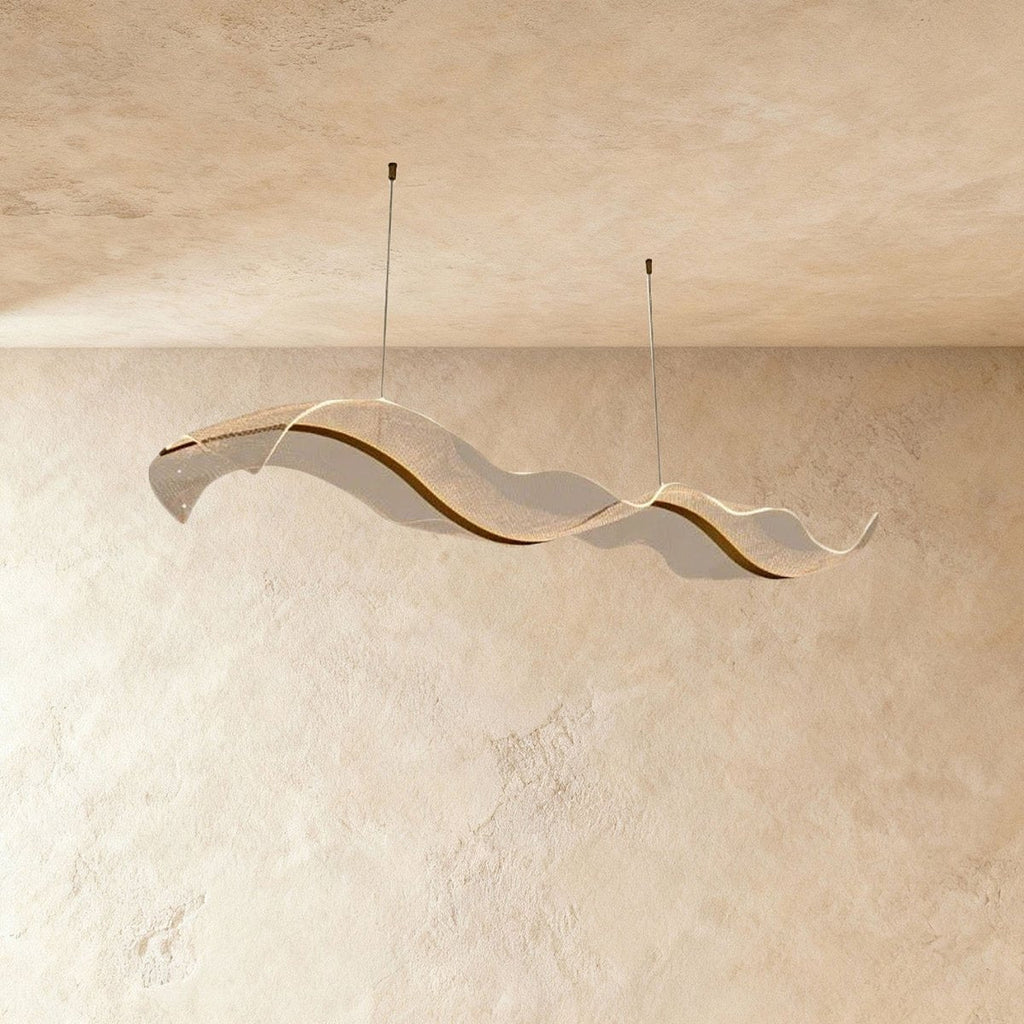 Clérachic's undulating acrylic chandelier hangs in profile, its rippled surface catching soft light.