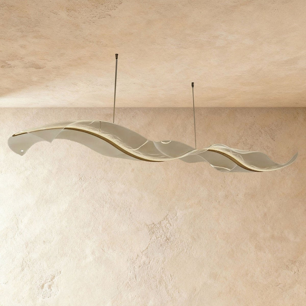 This Clérachic wave chandelier shows a smoother frosted acrylic finish along its curved form.