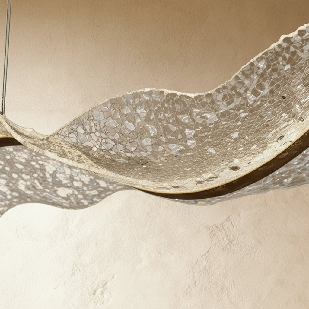 Close-up of the Clérachic chandelier's mosaic-textured acrylic shows a crackled, stone-like surface.
