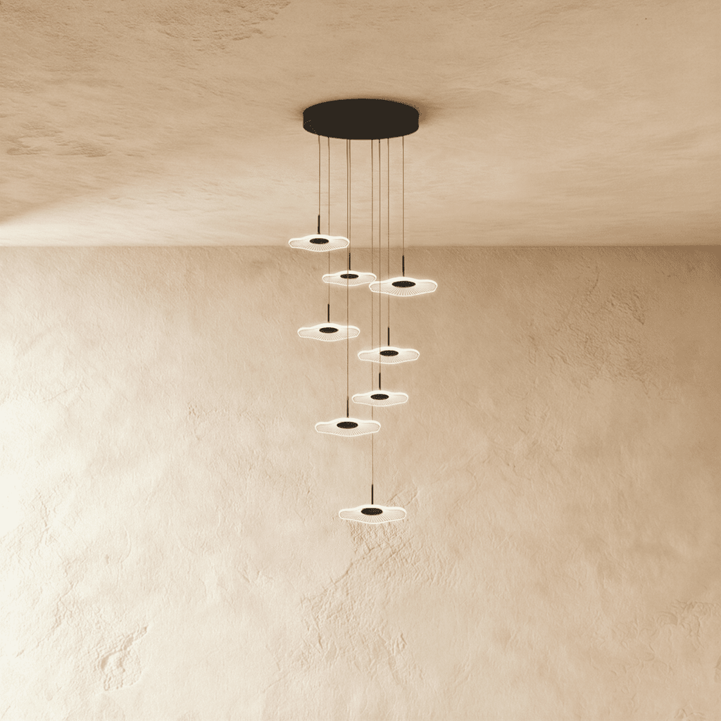 Clérachic staircase chandelier in black, its cascading flower-shaped discs viewed from a slightly different angle.
