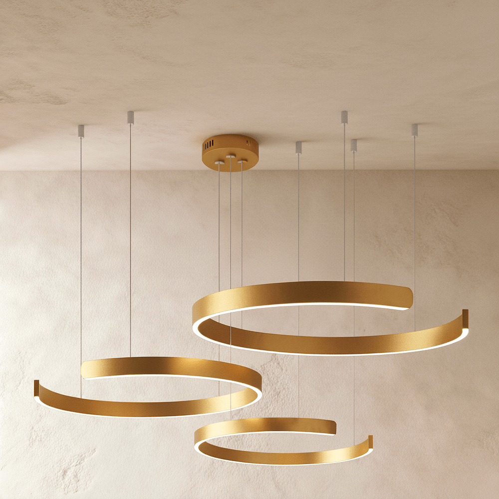 Clérachic's three-ring LED chandelier hangs in a warm gold finish, its rings staggered from small to large.