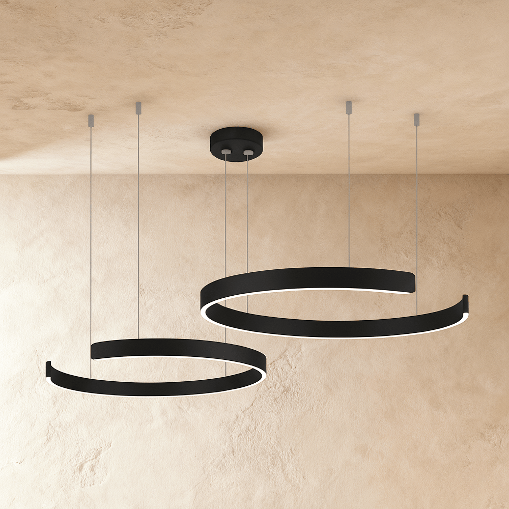 Clérachic's two-ring LED chandelier hangs in matte black, its round rings staggered at two heights.