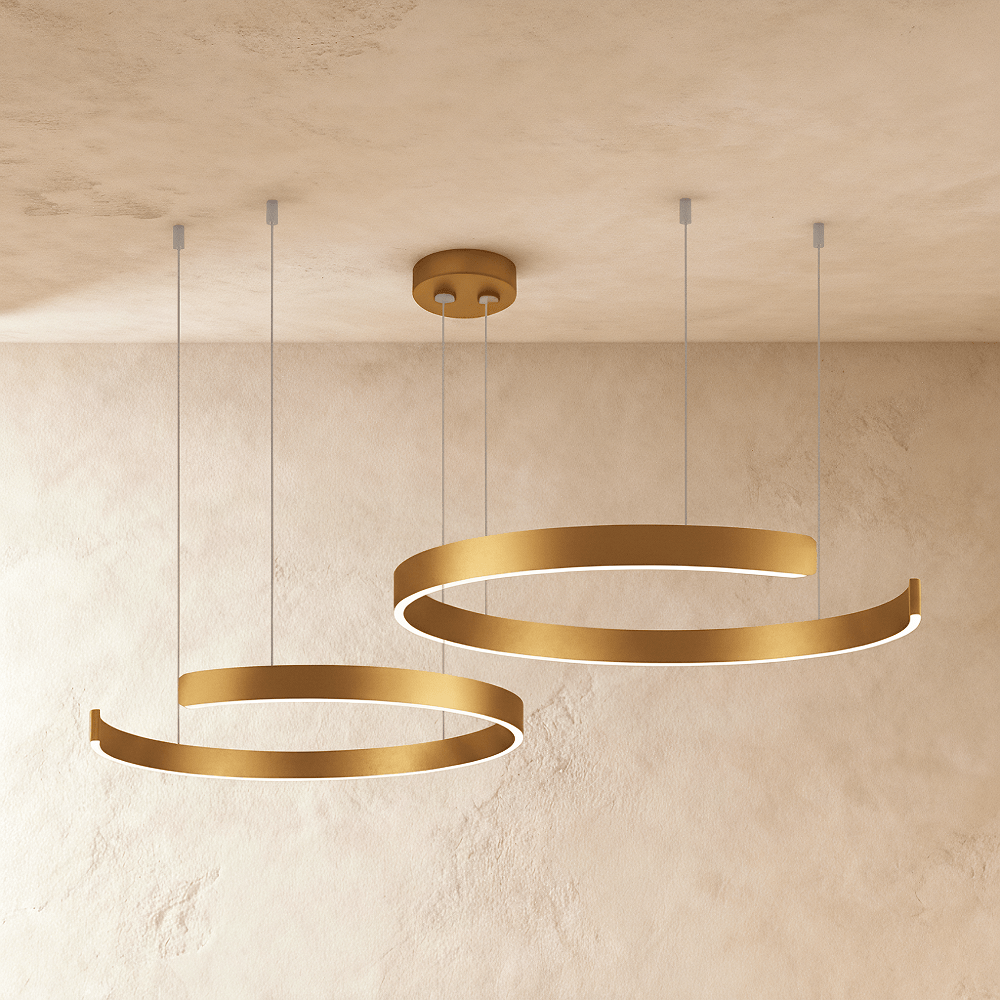 Clérachic's two-ring LED chandelier hangs in warm gold, its stacked rings glowing softly from below.