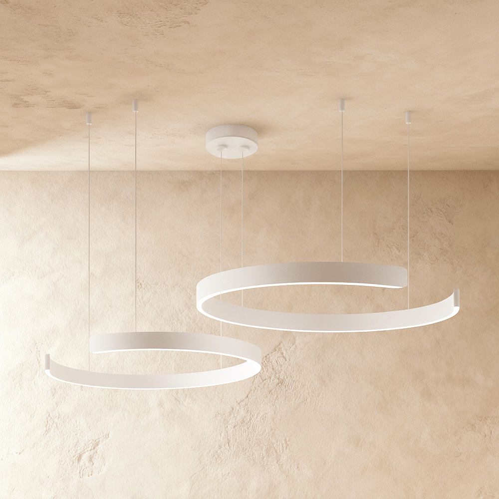 This Clérachic two-ring LED chandelier hangs in matte white, its stacked rings glowing softly from below.