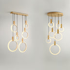 Clérachic long five-ring and round seven-ring versions of the lit acrylic and gold-toned ring pendant, side by side.