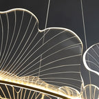 Clérachic close view of a clear acrylic leaf shade, its fine engraved veins glowing along the edge above a gold ring.