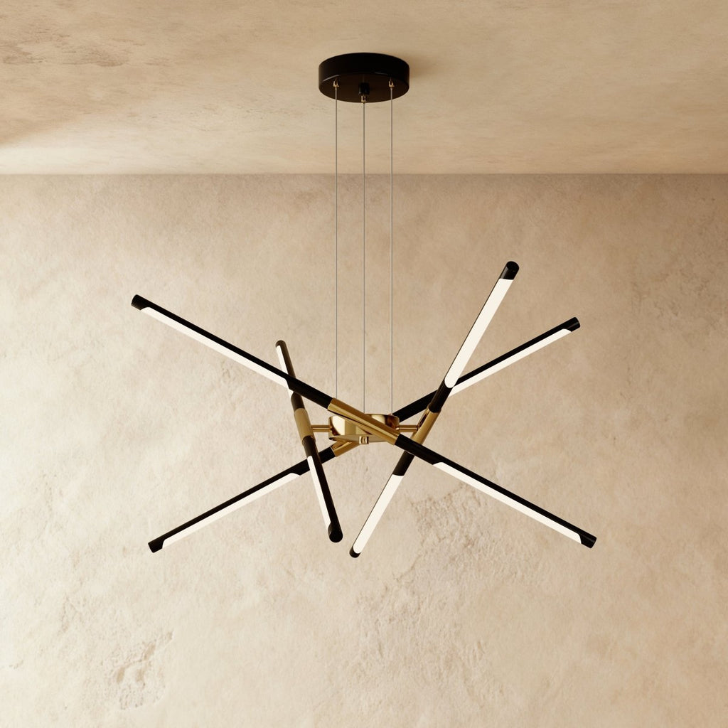 Clérachic eight-rod starburst chandelier in black and gold, its rotatable LED rods fanned out at different angles.