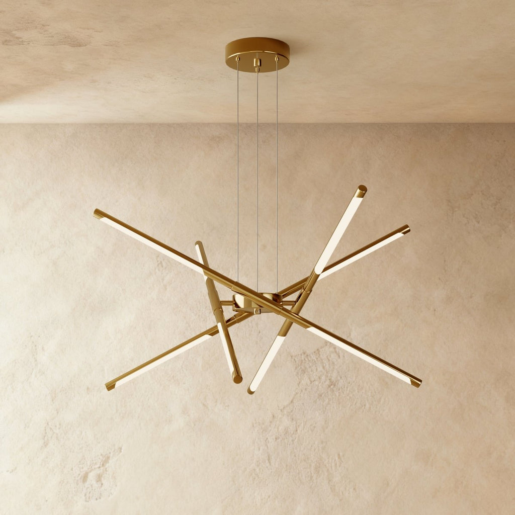 Clérachic eight-rod starburst chandelier in all-gold, its rotatable LED rods spread at different angles.