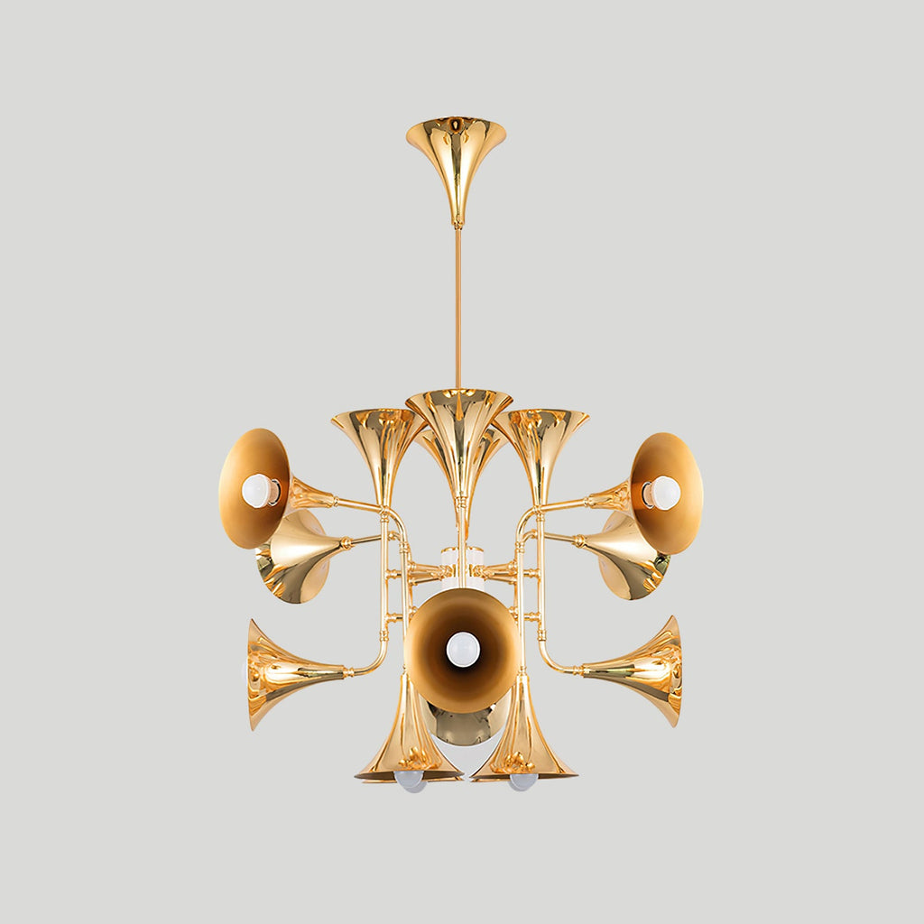 Smaller gold trumpet-head Clérachic chandelier on a plain light grey backdrop, hanging from a straight stem.