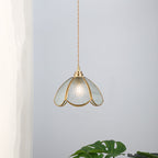 Close view of the Clérachic brass cone where it meets the fluted glass