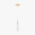 The single-drop Clérachic Gold-Flecked Glass Teardrop Pendant Light, one clear drop on a slim cable under a round gold canopy.