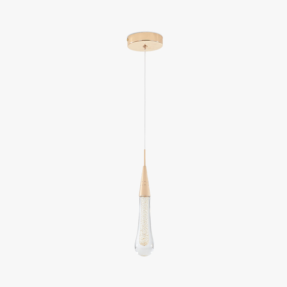 The single-drop Clérachic Gold-Flecked Glass Teardrop Pendant Light, one clear drop on a slim cable under a round gold canopy.