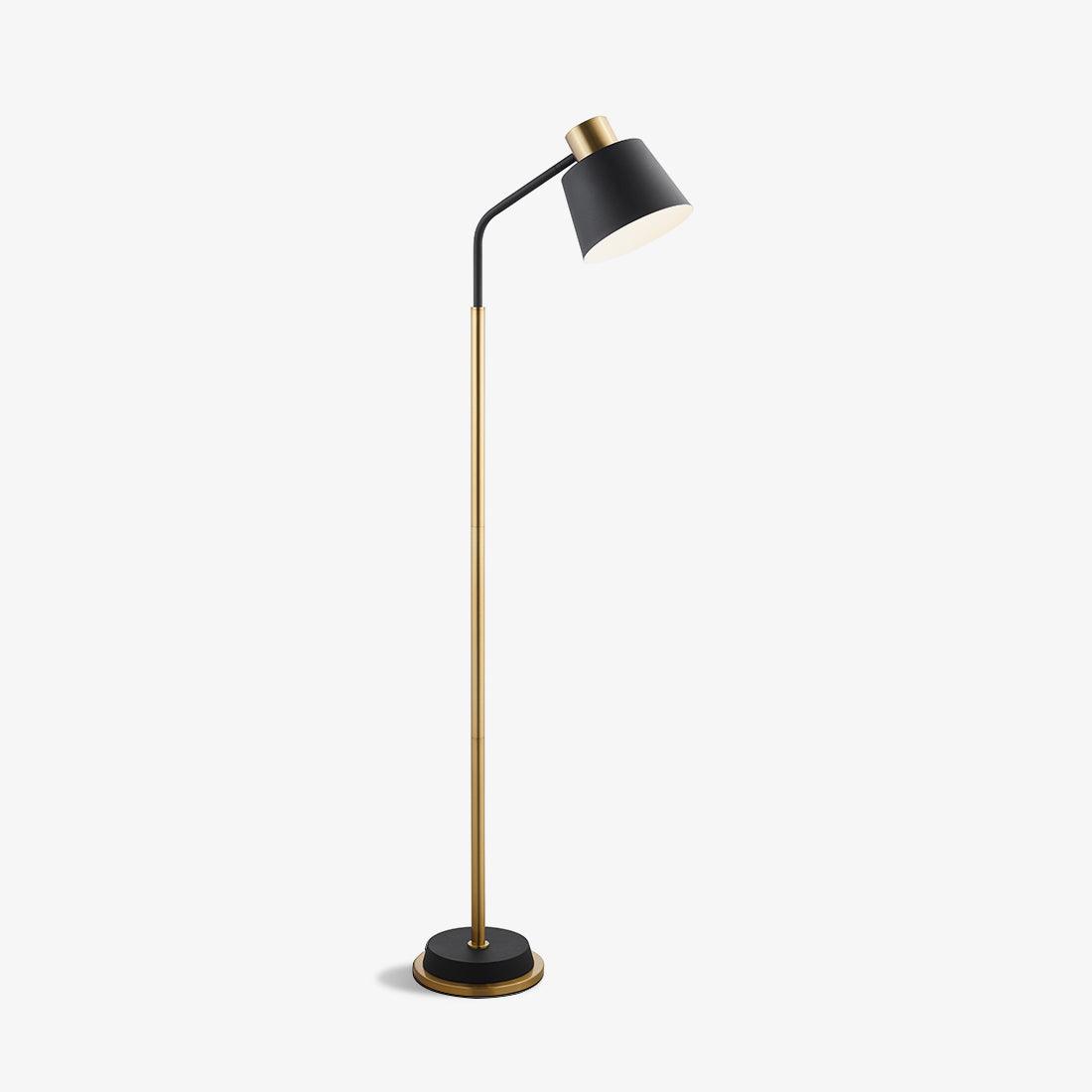 Clérachic floor lamp shown whole on a white backdrop, with a black shade, gold stem and black base with a gold rim.
