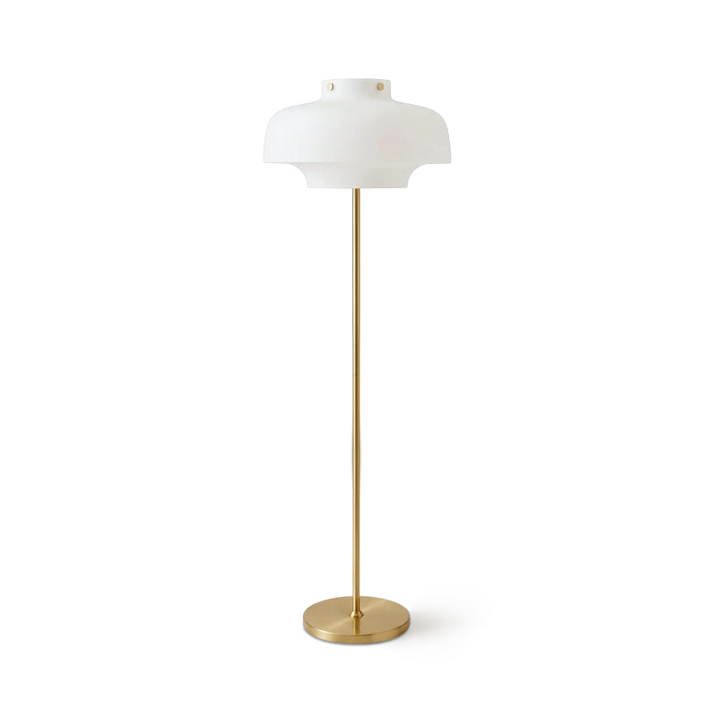 Full-length view of this Clérachic floor lamp on white, its white glass dome atop a thin brass stem and a low round base.