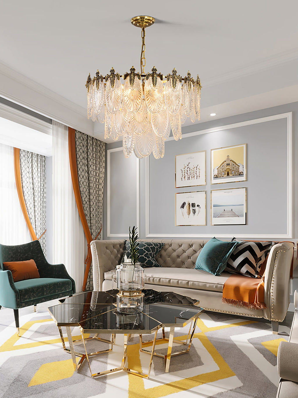 Clérachic leaf chandelier hanging in a grey living room with a tufted sofa, a teal armchair and a glass coffee table on a yellow patterned rug.