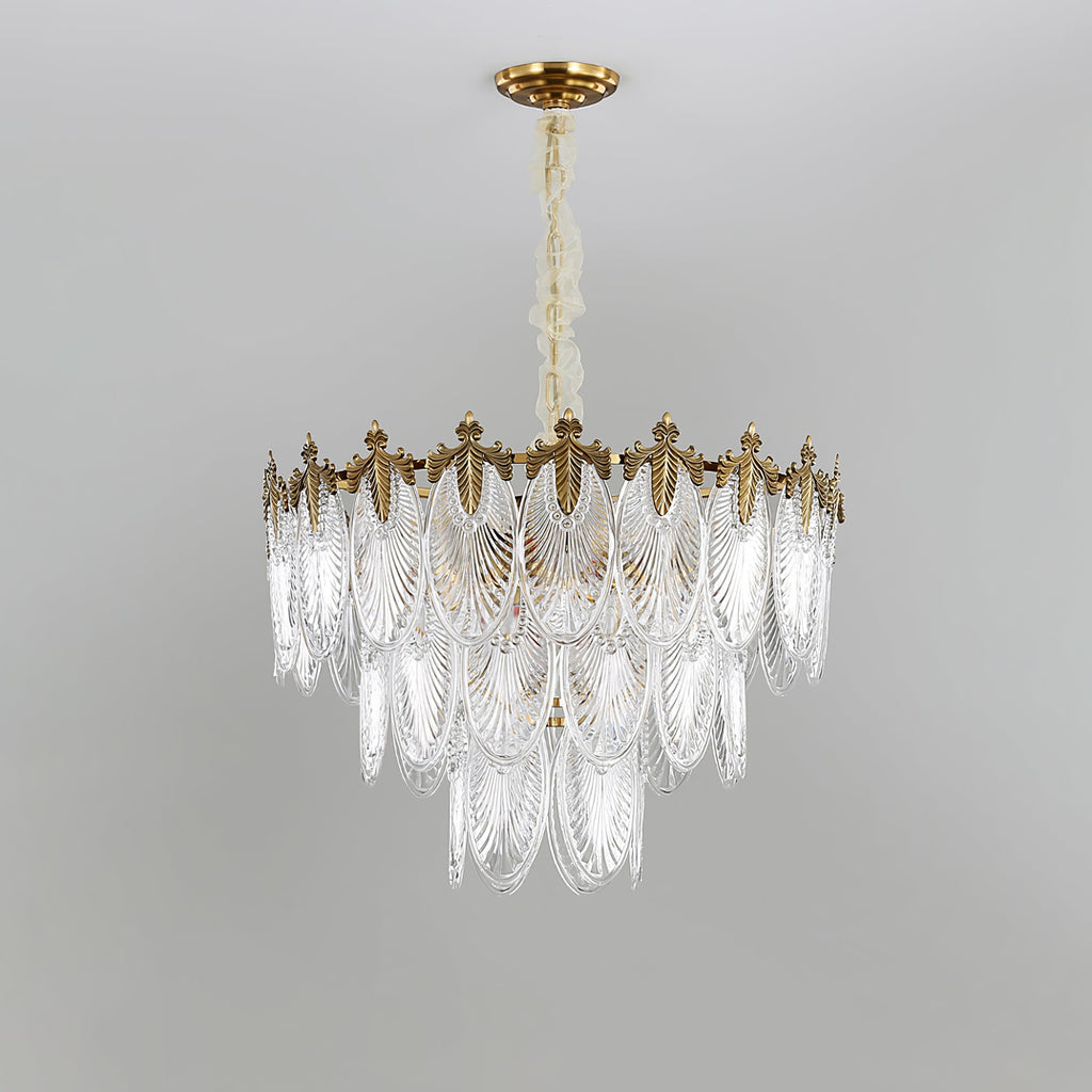 Tall four-tier Clérachic chandelier on a grey backdrop, its clear glass leaves narrowing towards the bottom, unlit.