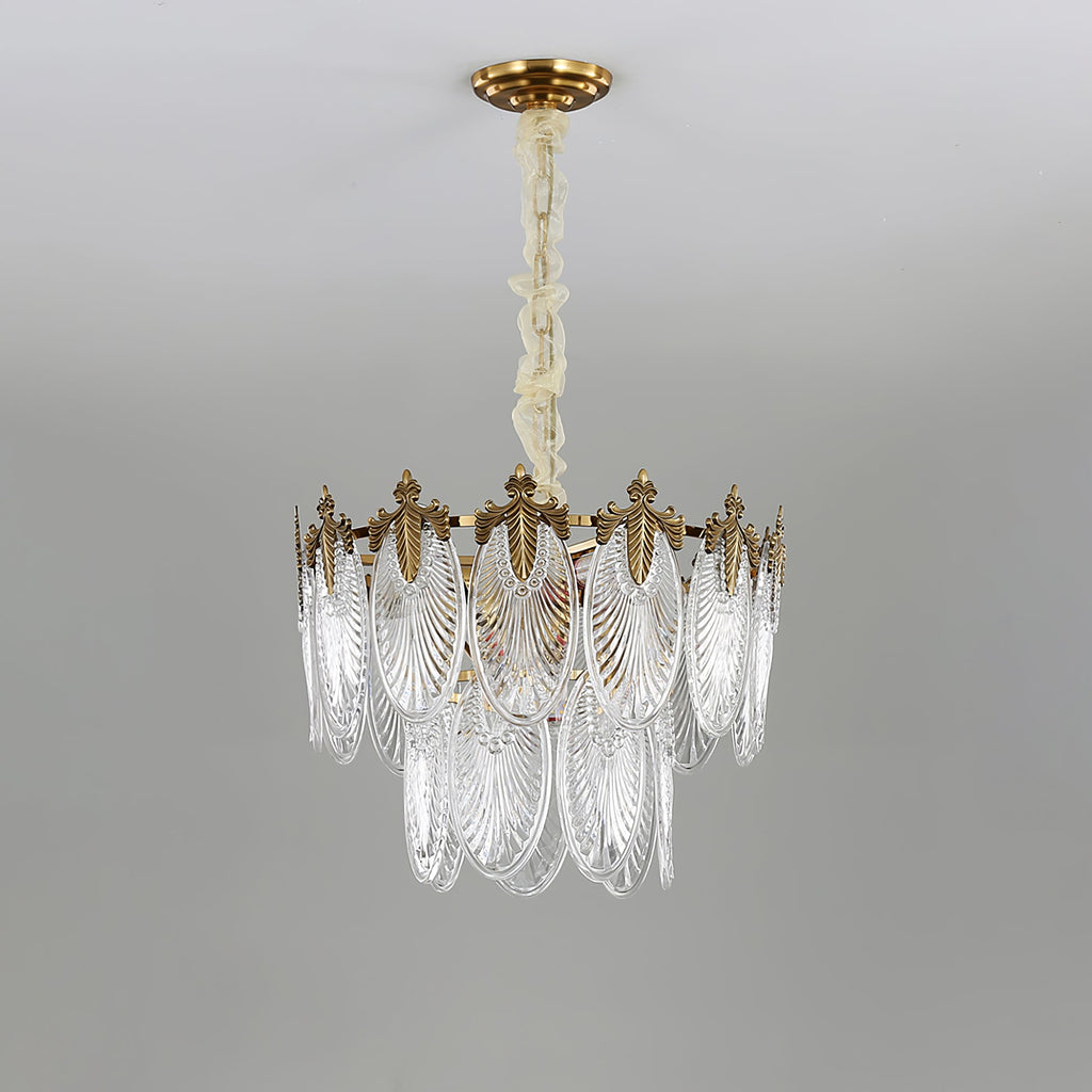 Two-tier Clérachic chandelier on a grey backdrop, with a longer chain and a lower tier of glass leaves hanging below the crown, unlit.