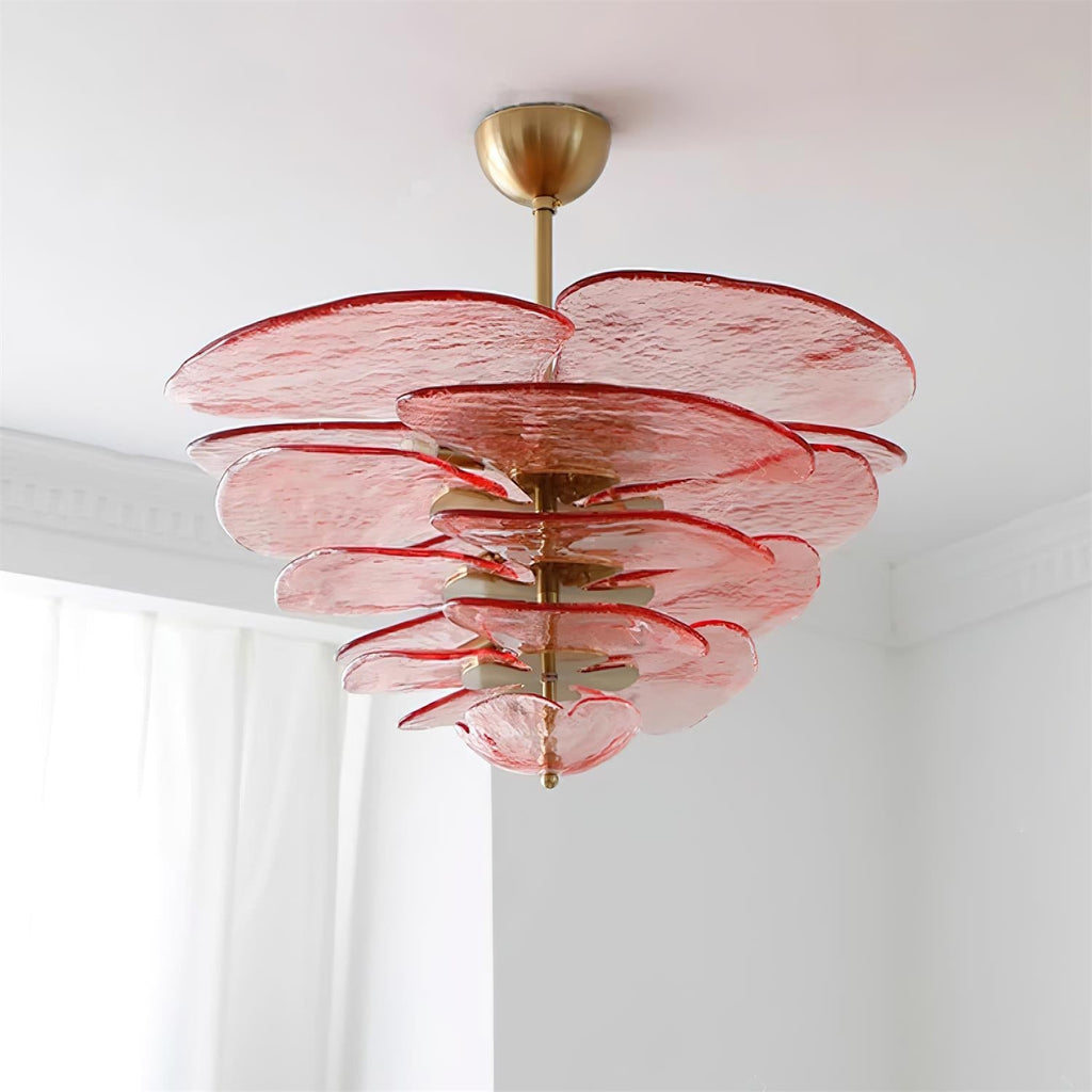 Pink Clérachic petal chandelier seen from below, with wide rippled glass discs in tiers around a central brass rod.