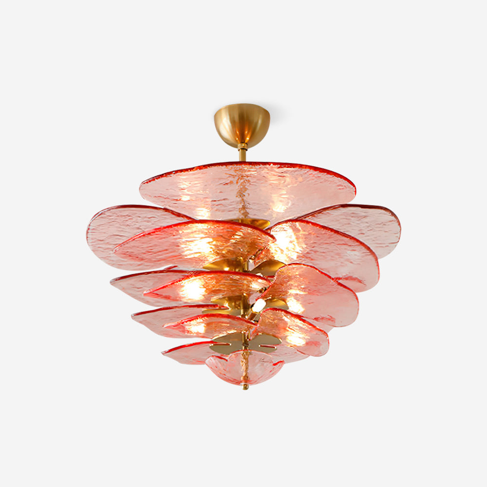 Pink and gold Clérachic chandelier on a pale backdrop, lit, with red-edged glass petals and a brass ceiling cup.