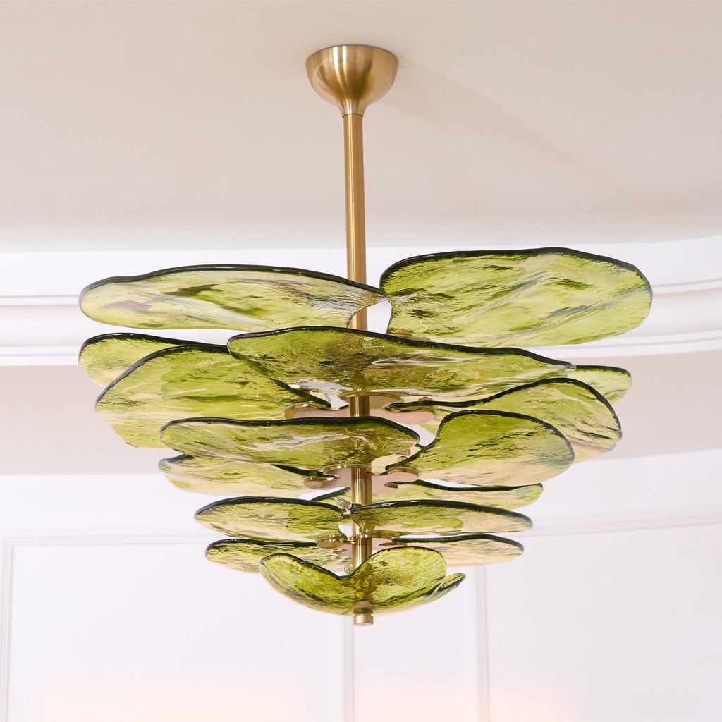 Large green Clérachic chandelier seen from below, with a thick brass rod and overlapping petals of rippled olive glass.